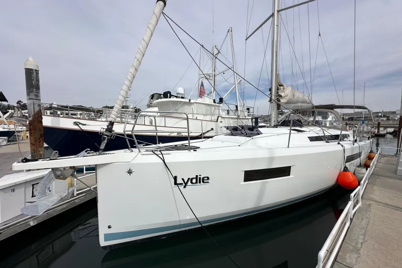  Yacht Photos Pics 2019 Jeanneau Sun Odyssey 440 sailboat docked at marina, named "Lydie".