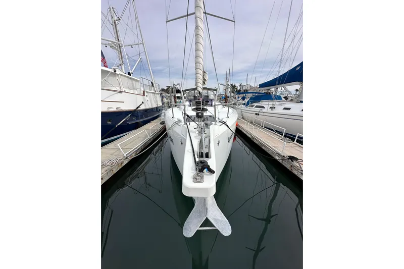  Yacht Photos Pics 2019 Jeanneau Sun Odyssey 440 sailboat docked at marina, front view.