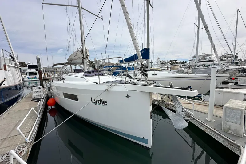  Yacht Photos Pics 2019 Jeanneau Sun Odyssey 440 sailboat docked at marina, named "Lydie."