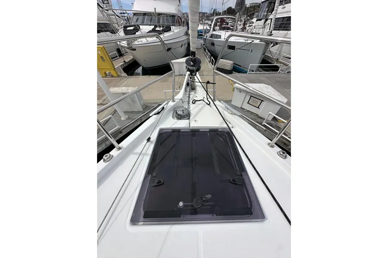 Yacht Photos Pics 2019 Jeanneau Sun Odyssey 440 yacht docked at marina, showcasing sleek deck design.