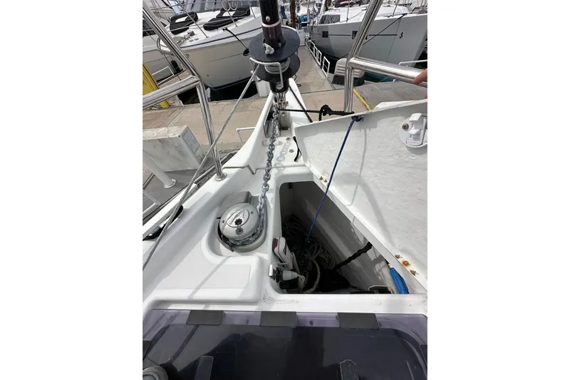  Yacht Photos Pics Jeanneau Sun Odyssey 440 (2019) anchor chain and deck details at marina.