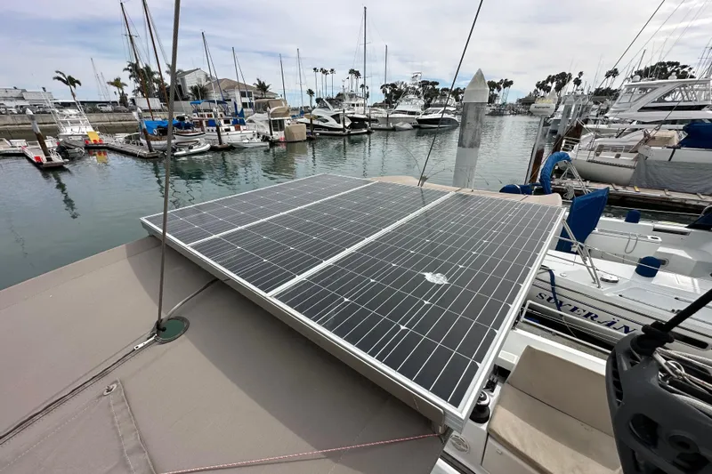 Yacht Photos Pics Solar panels on Jeanneau Sun Odyssey 440 sailboat docked in marina, 2019 model.