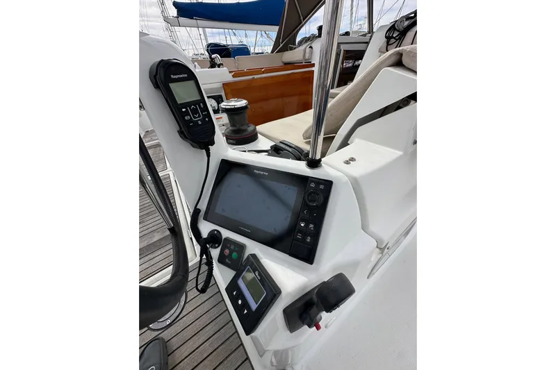  Yacht Photos Pics Cockpit of 2019 Jeanneau Sun Odyssey 440 with navigation equipment and controls.