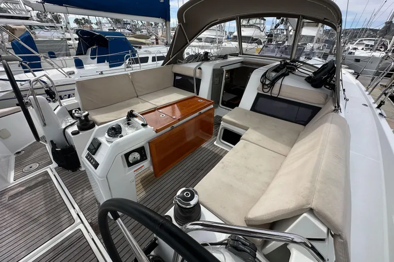  Yacht Photos Pics 2019 Jeanneau Sun Odyssey 440 cockpit with spacious seating and modern navigation equipment.
