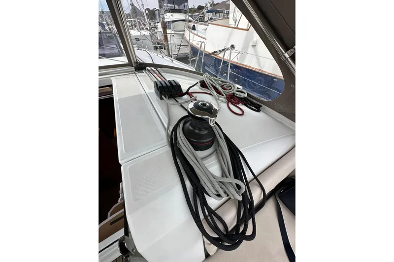  Yacht Photos Pics Jeanneau Sun Odyssey 440 sailboat deck with winch and ropes, 2019 model.