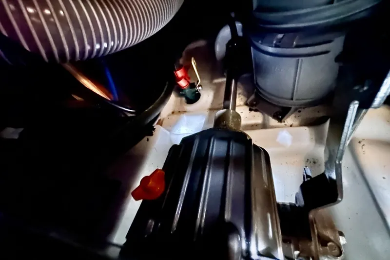  Yacht Photos Pics Engine compartment of 2019 Jeanneau Sun Odyssey 440 sailboat, showing mechanical components.