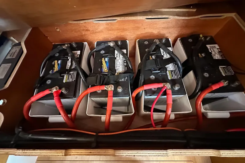  Yacht Photos Pics Battery compartment of 2019 Jeanneau Sun Odyssey 440 sailboat with four batteries.