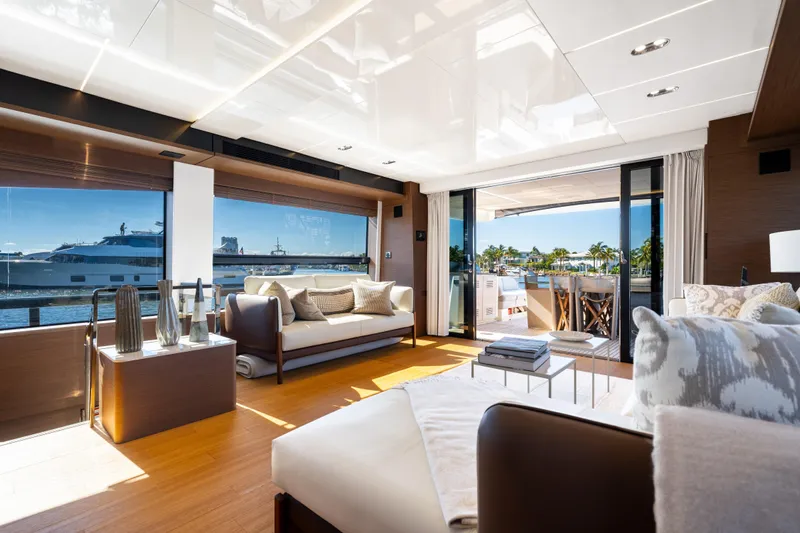  Yacht Photos Pics Luxurious interior of 2022 Prestige X70 yacht with elegant furnishings and waterfront view.