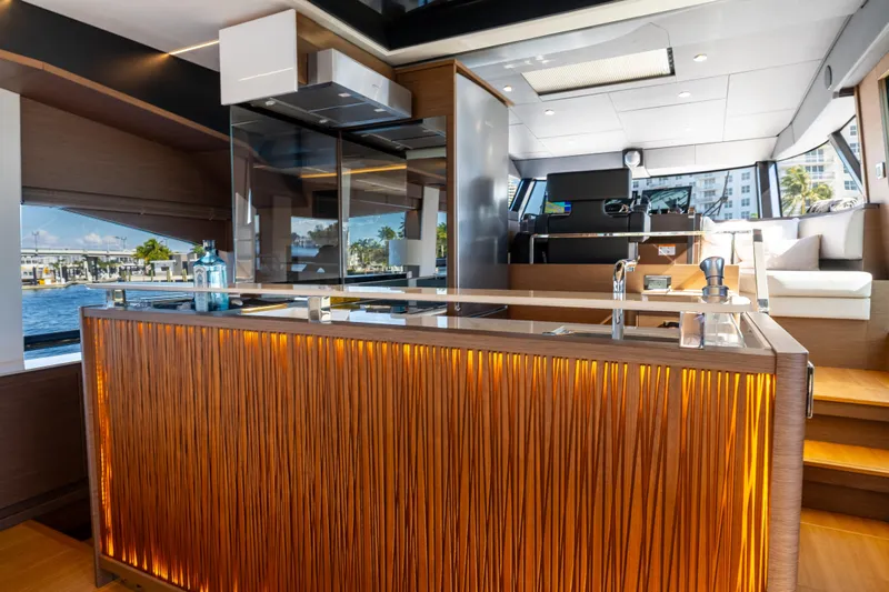  Yacht Photos Pics Luxurious interior of 2022 Prestige X70 yacht with modern kitchen and elegant design.