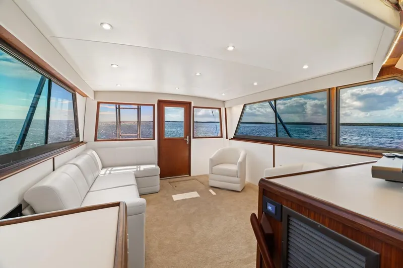 Bella Yacht Photos Pics Interior of 1978 Hatteras 45 Convertible yacht with panoramic ocean views.