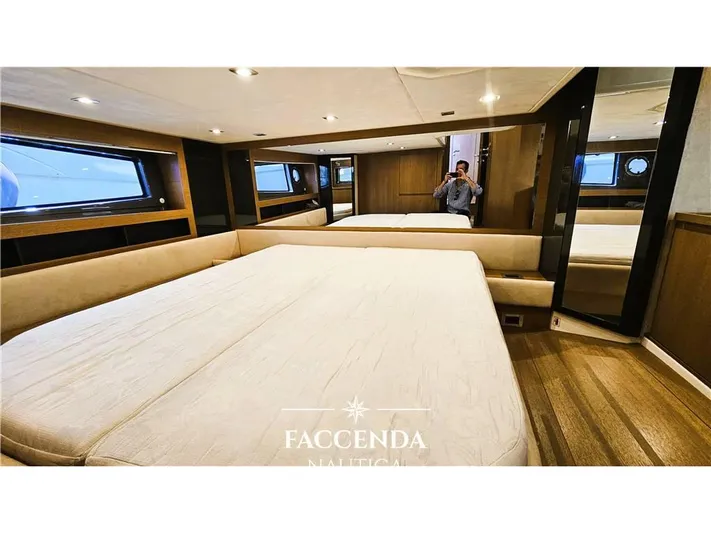  Yacht Photos Pics Luxurious interior of 2013 Azimut Atlantis 44 yacht with spacious bed and modern design.