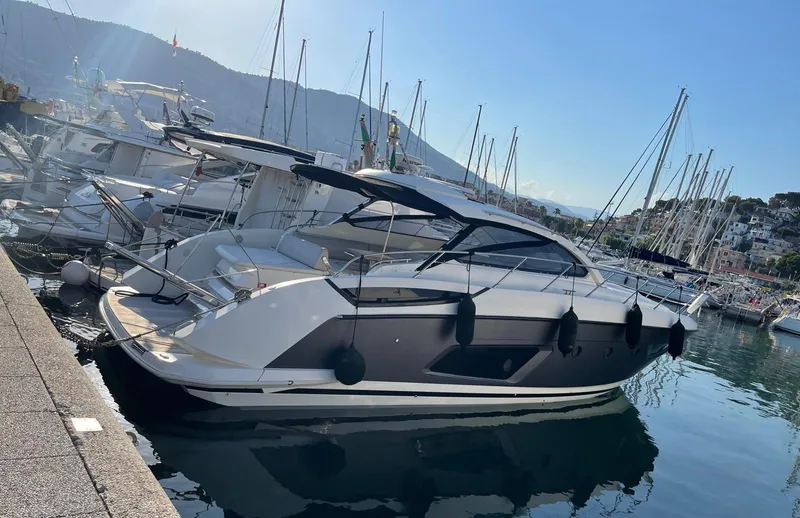  Yacht Photos Pics 2013 Azimut Atlantis 44 yacht docked in a scenic marina.