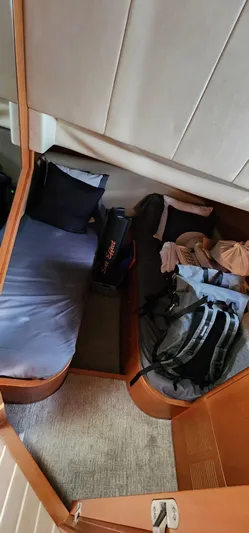 Side Effeot Yacht Photos Pics Interior cabin of a 2007 Uniesse 54 Sport yacht with twin beds.