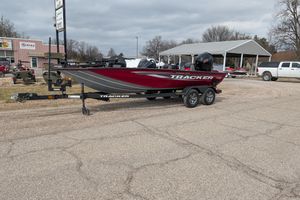 2025 Tracker Pro Team 195 Tournament Edition boat on trailer in outdoor setting.
