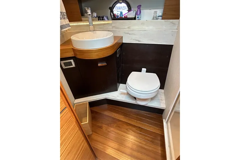 Silver Lining Yacht Photos Pics 2017 Tiara Yachts C39 Coupe bathroom with modern sink and toilet.