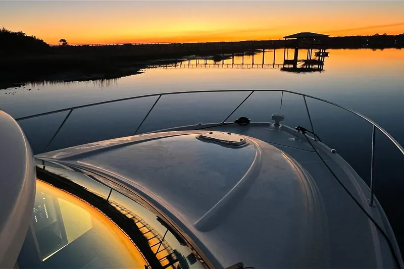 Silver Lining Yacht Photos Pics 2017 Tiara Yachts C39 Coupe at sunset on calm waters.