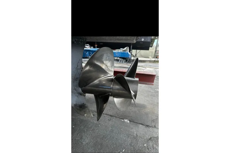  Yacht Photos Pics 2013 Beneteau Flyer GT 34 boat propeller in a maintenance area.