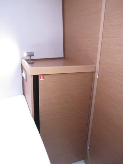  Yacht Photos Pics 2025 Jeanneau Sun Odyssey 350 interior cabinet with modern wood finish.