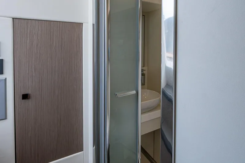 Lucky Ladies Yacht Photos Pics Interior view of 2022 Sunseeker Manhattan 68 yacht bathroom with modern design.
