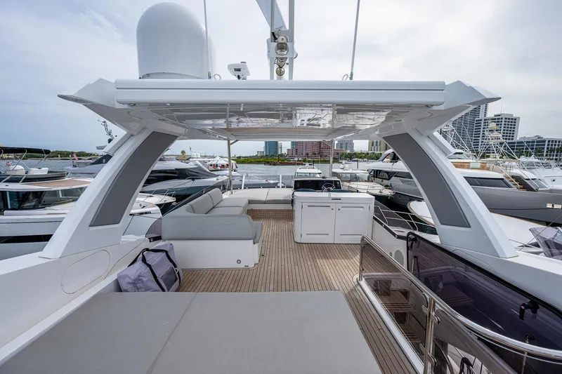 Lucky Ladies Yacht Photos Pics Luxury Sunseeker Manhattan 68 yacht interior, 2022 model, featuring spacious deck and modern amenities.