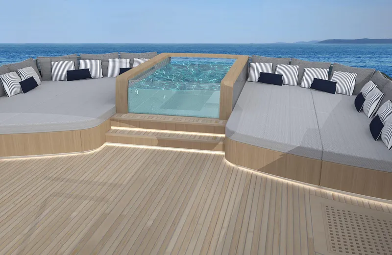  Yacht Photos Pics Luxurious ISA Classic 57 yacht deck with jacuzzi, 2026 model, featuring elegant seating and ocean view.