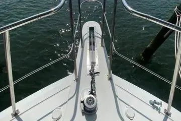 Thistle Do Nicely Yacht Photos Pics Bow view of 1997 Navigator 4200 yacht with stainless steel railings.