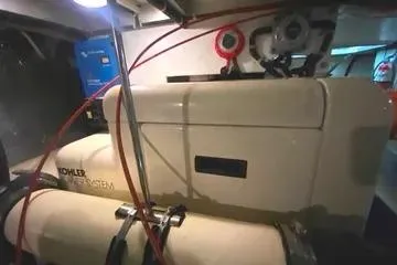 Thistle Do Nicely Yacht Photos Pics Engine room of 1997 Navigator 4200 yacht with Kohler generator and wiring.