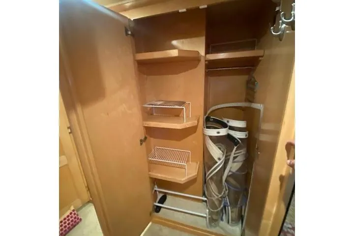Thistle Do Nicely Yacht Photos Pics Wooden closet with shelves and storage, Navigator 4200, 1997 model.