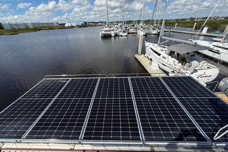 Waymaker Yacht Photos Pics Solar panels on 2018 Fountaine Pajot Saona 47 catamaran docked at marina.