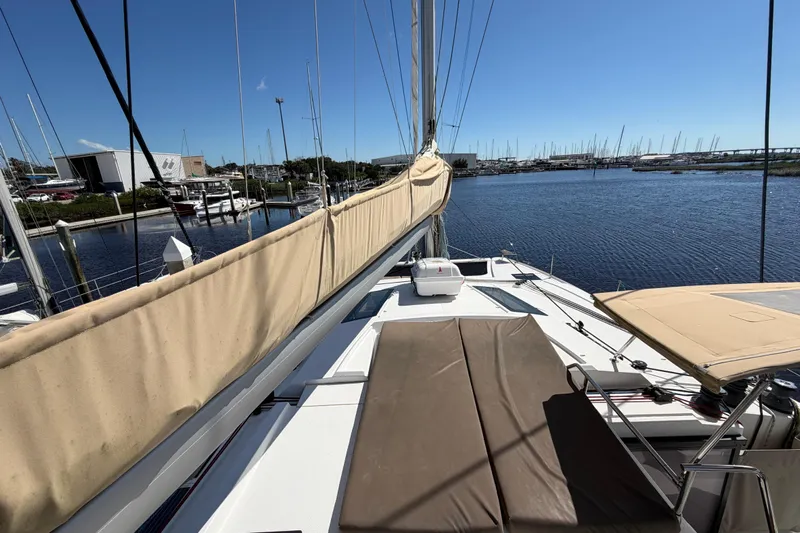 Waymaker Yacht Photos Pics 2018 Fountaine Pajot Saona 47 catamaran docked at marina under clear blue sky.