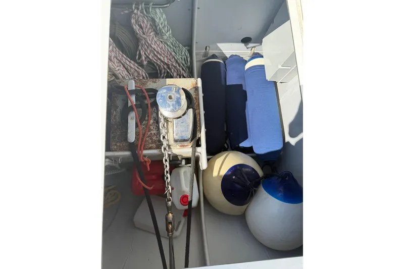 Waymaker Yacht Photos Pics Storage compartment of 2018 Fountaine Pajot Saona 47 with ropes and fenders.
