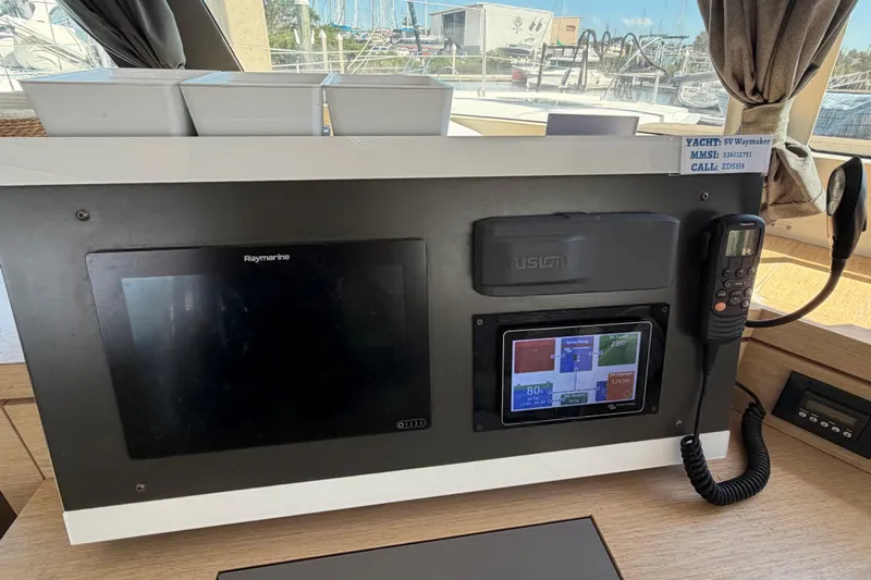 Waymaker Yacht Photos Pics Control panel of 2018 Fountaine Pajot Saona 47 yacht with navigation and communication equipment.