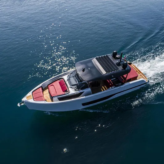  Yacht Photos Pics 2025 Cranchi A46 Luxury Tender cruising on sparkling blue water.