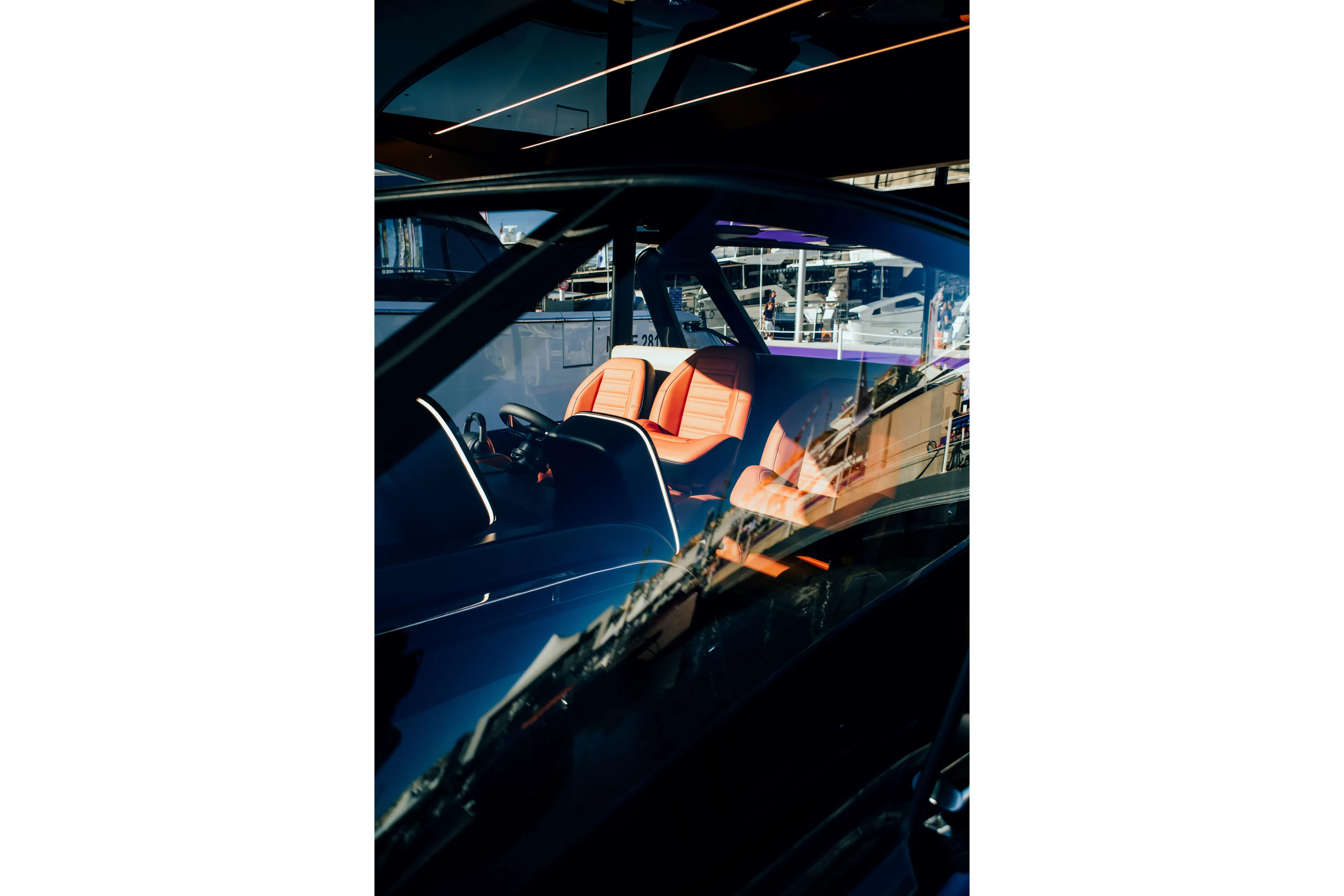  Yacht Photos Pics Interior view of 2025 Cranchi A46 Luxury Tender with orange seats and sleek design.