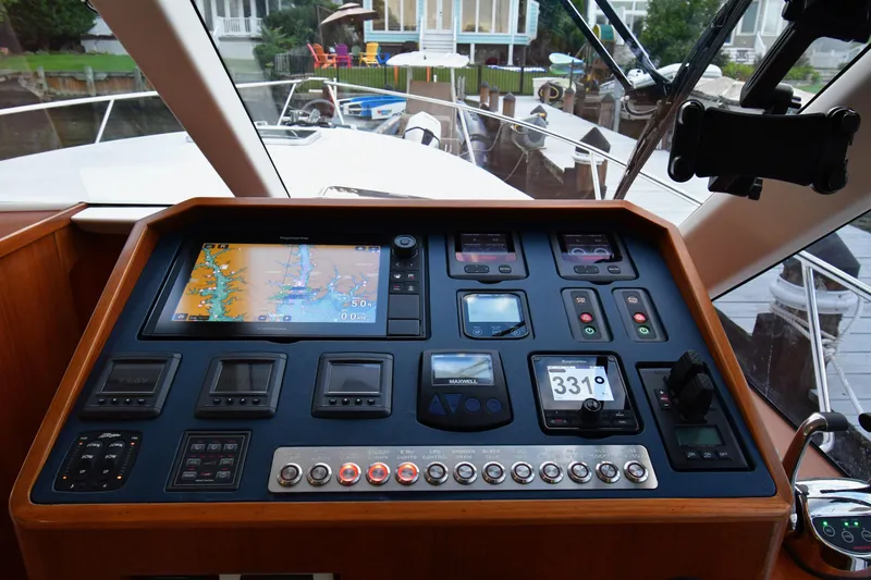 Promesa Yacht Photos Pics Control panel of a 2021 Hylas M44 yacht with navigation and monitoring systems.