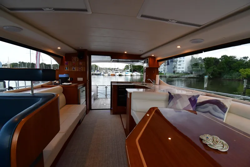 Promesa Yacht Photos Pics Luxurious interior of 2021 Hylas M44 yacht with marina view.