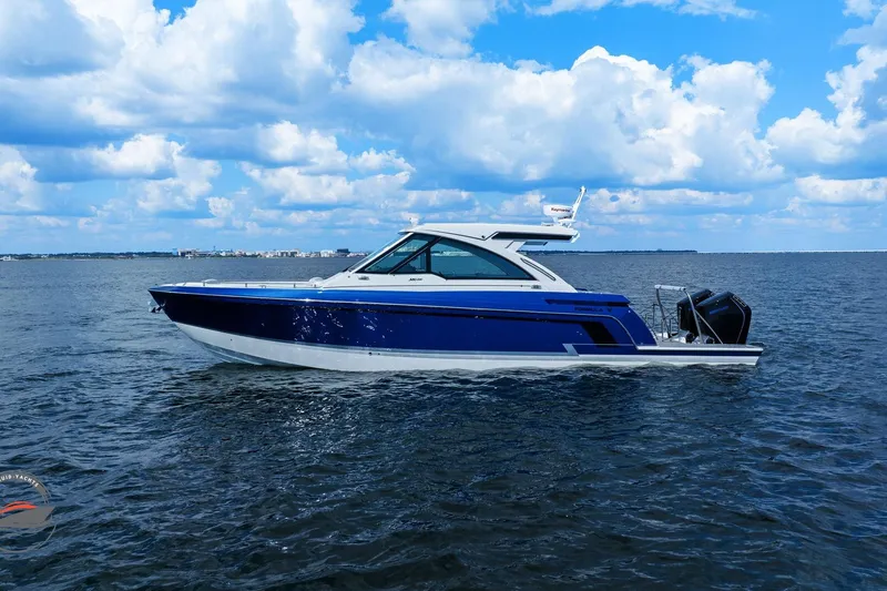 Lucca 2 Yacht Photos Pics 2025 Formula 380 Super Sport Crossover OB on open water under blue sky.