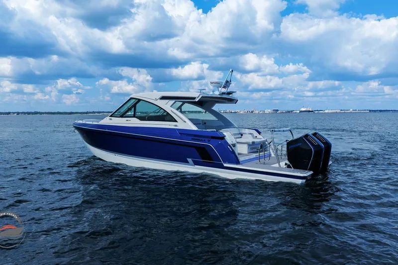 Lucca 2 Yacht Photos Pics 2025 Formula 380 Super Sport Crossover OB on open water under a cloudy sky.