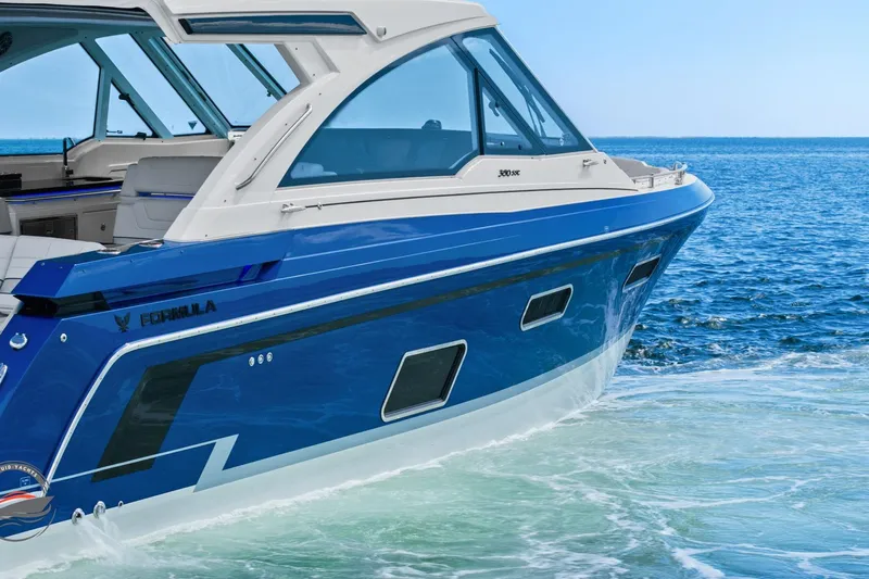 Lucca 2 Yacht Photos Pics 2025 Formula 380 Super Sport Crossover OB cruising on blue ocean waters.