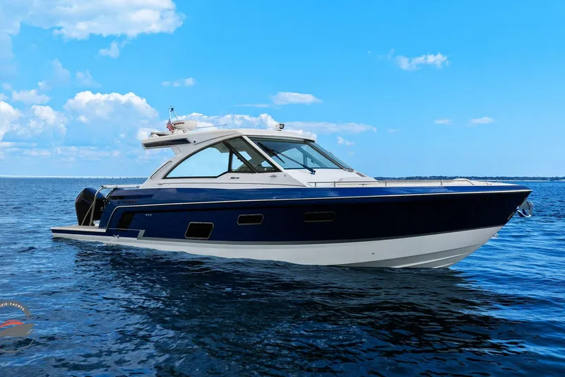 Lucca 2 Yacht Photos Pics 2025 Formula 380 Super Sport Crossover OB on open water under blue sky.