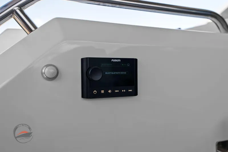 Lucca 2 Yacht Photos Pics 2025 Formula 380 Super Sport Crossover OB audio control panel on sleek white dashboard.