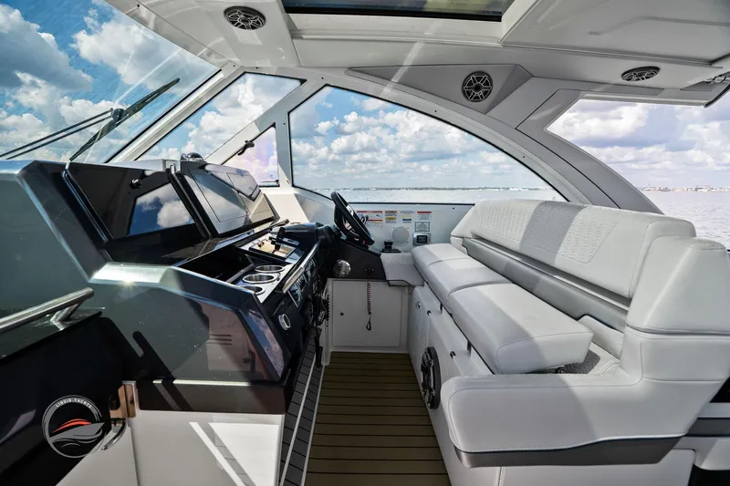 Lucca 2 Yacht Photos Pics 2025 Formula 380 Super Sport Crossover OB interior with modern helm and seating.