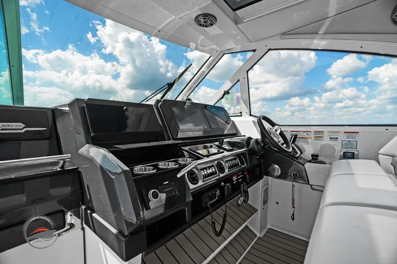 Lucca 2 Yacht Photos Pics 2025 Formula 380 Super Sport Crossover OB cockpit with modern controls and panoramic view.