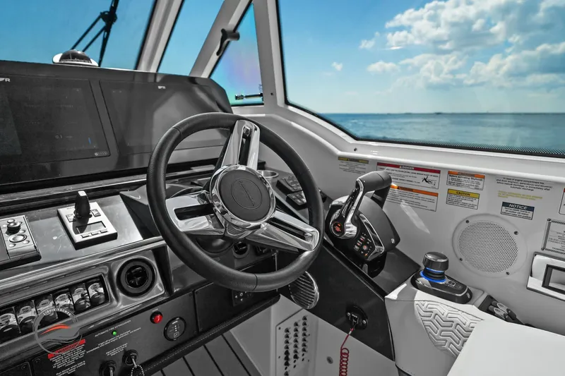 Lucca 2 Yacht Photos Pics 2025 Formula 380 Super Sport Crossover OB helm with modern controls and ocean view.