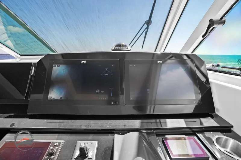 Lucca 2 Yacht Photos Pics 2025 Formula 380 Super Sport Crossover OB dashboard with dual screens and ocean view.