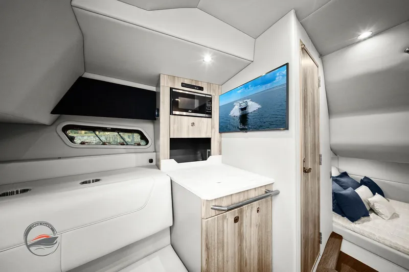 Lucca 2 Yacht Photos Pics 2025 Formula 380 Super Sport Crossover OB interior with modern kitchenette and cozy seating area.