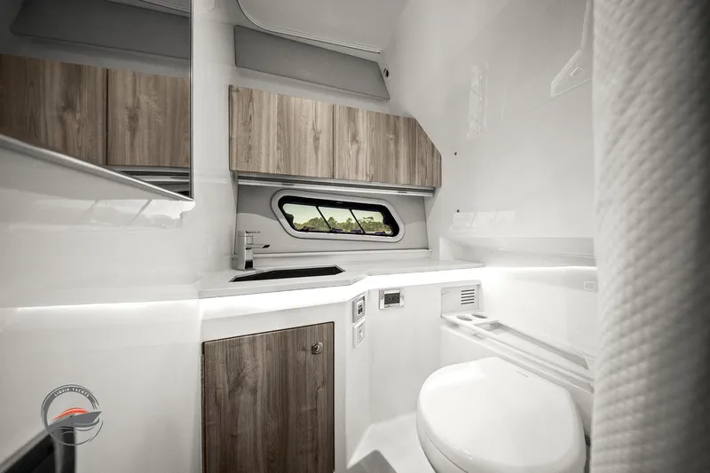 Lucca 2 Yacht Photos Pics 2025 Formula 380 Super Sport Crossover OB bathroom with modern design and wood accents.
