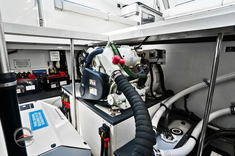 Lucca 2 Yacht Photos Pics Engine compartment of 2025 Formula 380 Super Sport Crossover OB, showcasing mechanical components.