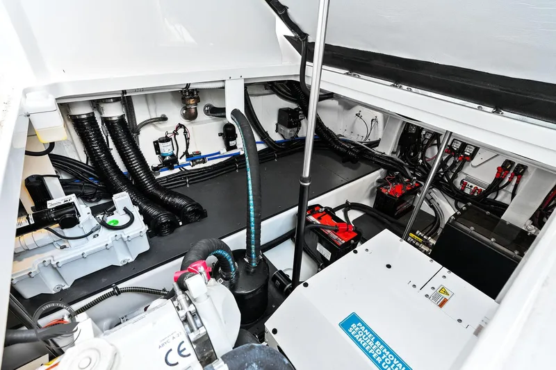 Lucca 2 Yacht Photos Pics Engine compartment of 2025 Formula 380 Super Sport Crossover OB, showcasing wiring and components.