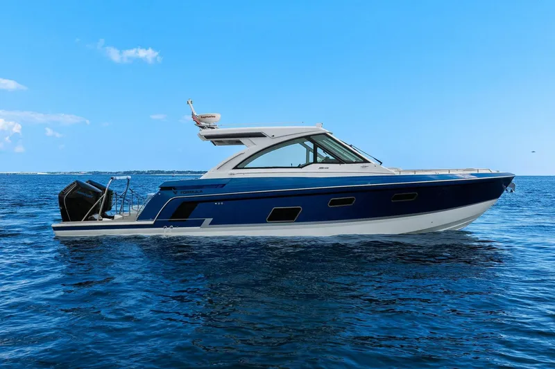 Lucca 2 Yacht Photos Pics 2025 Formula 380 Super Sport Crossover OB boat on open water under clear blue sky.